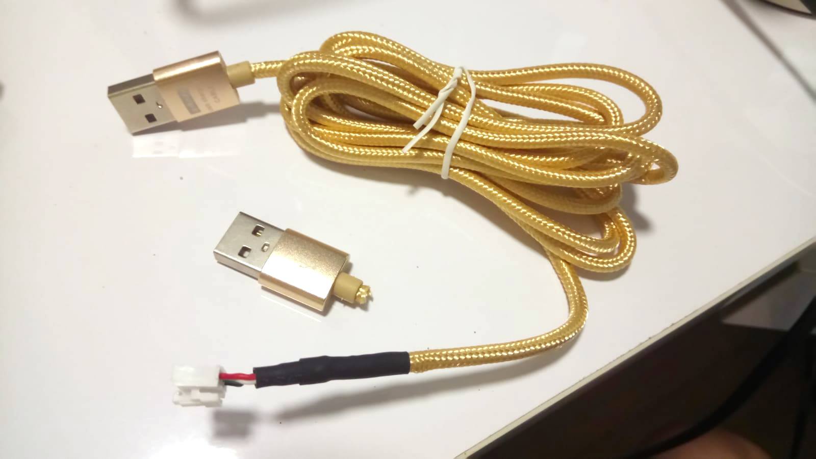 Shiny golden USB cable