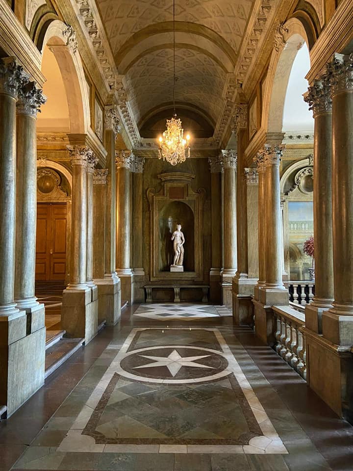 Well preserved sculptures and chandeliers decorate the interior.